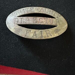Antique White County Director Fair Badge